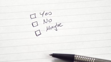 Checkboxes for Yes, No, Maybe in handwriting on lined paper with pen