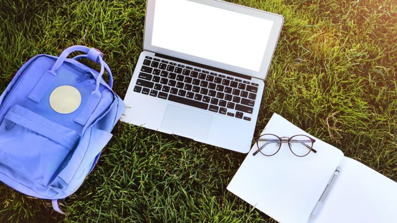 Laptop,notebook and eye glasses.